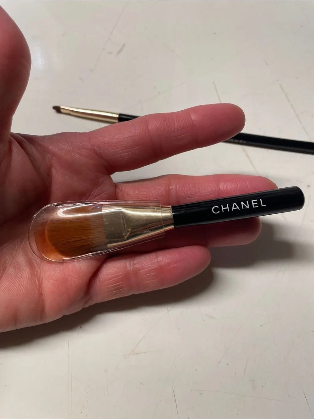 CHANEL Black & Gold mini foundation Brush, eye liner brush black mascara.